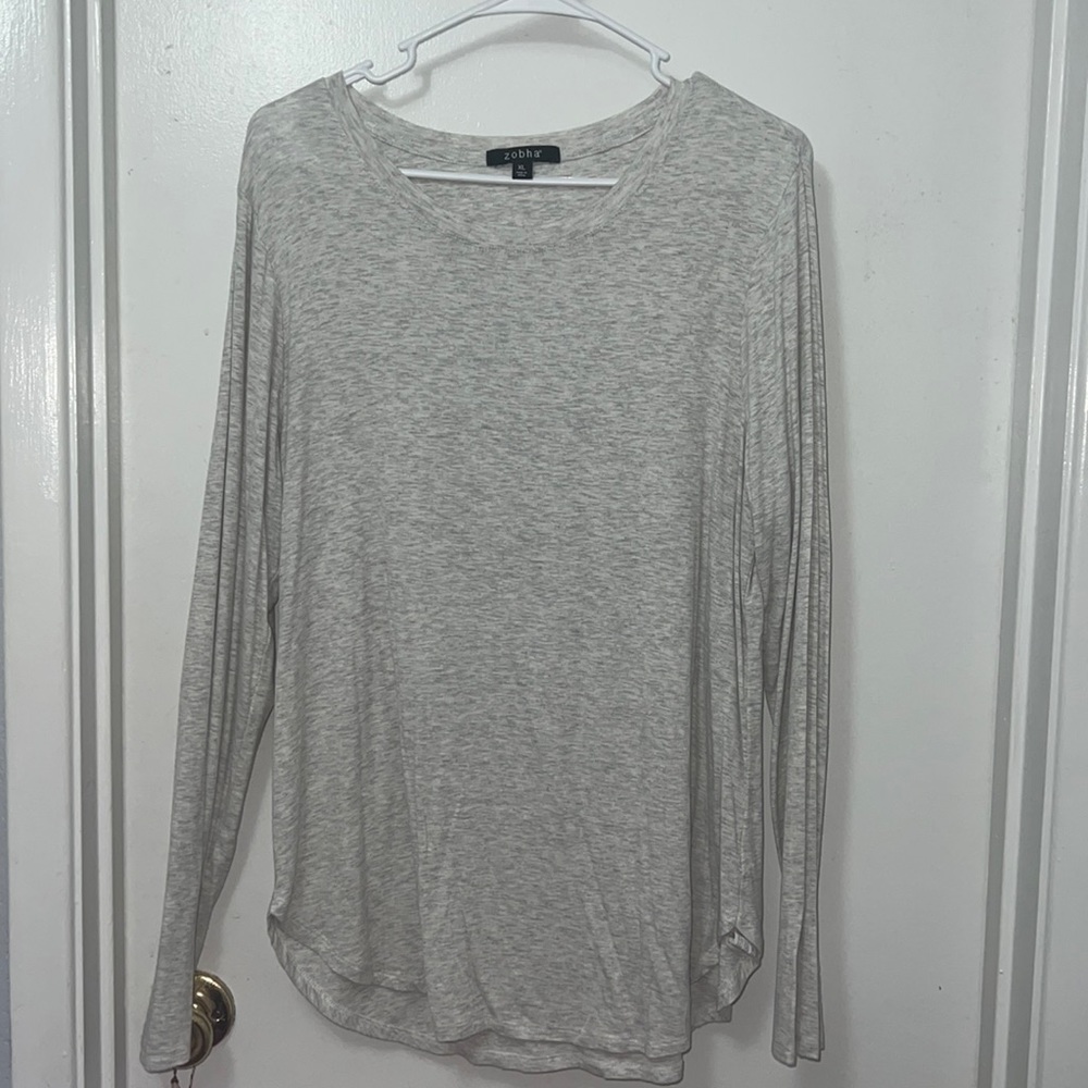Long sleeve top with slits in wrists